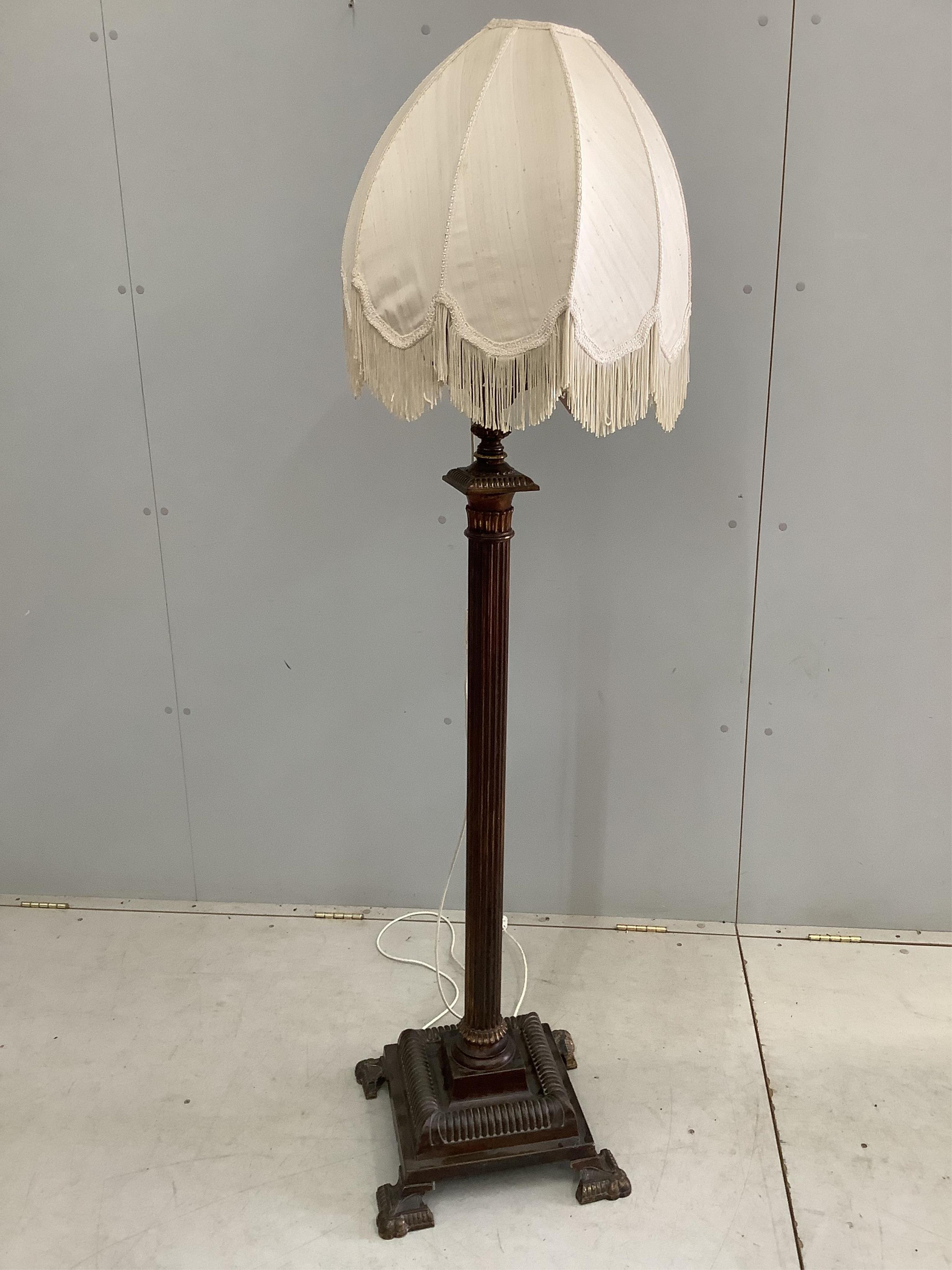 A Victorian style brass telescopic oil lamp standard converted to electricity, height 140cm